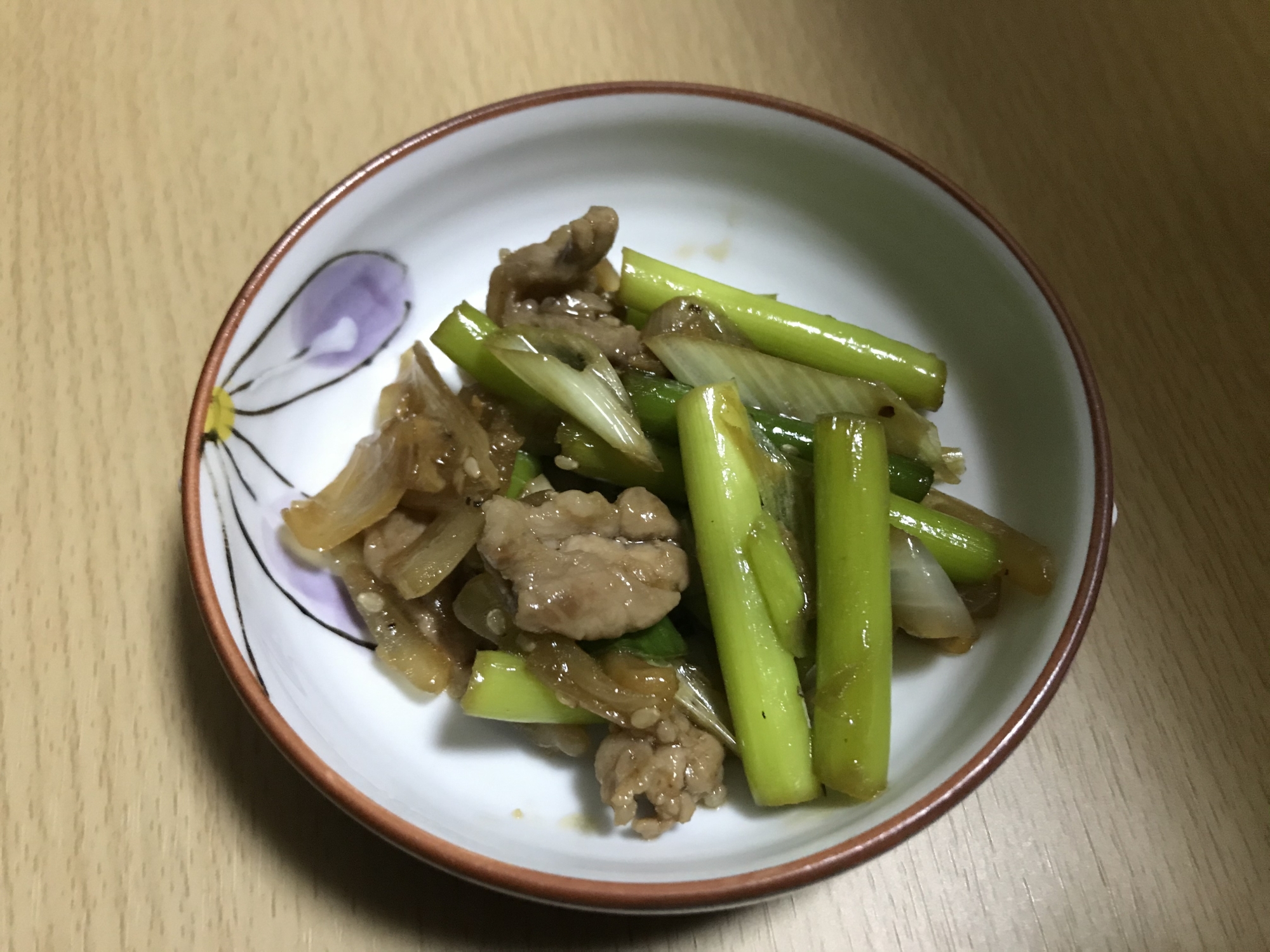 豚肉と玉ねぎとニンニクの芽炒め