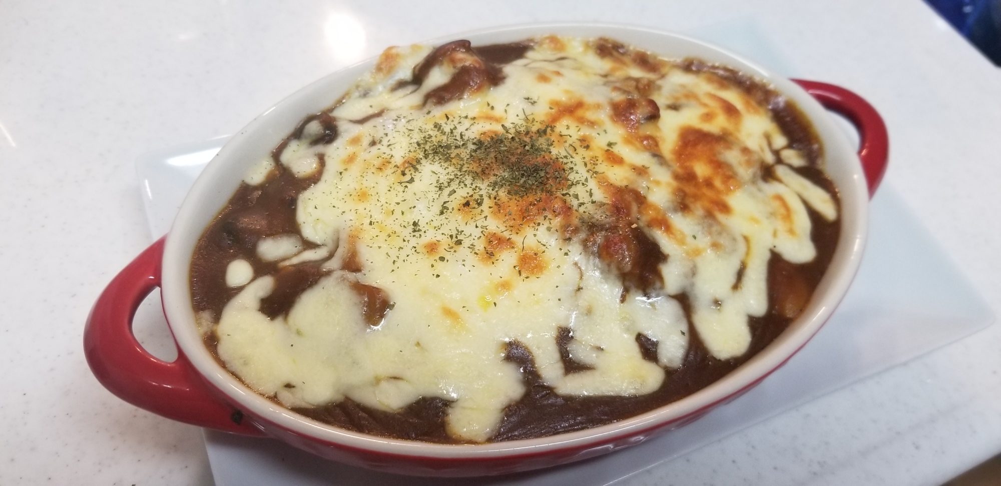 カレーリメイク☆半熟たまごの焼きカレー