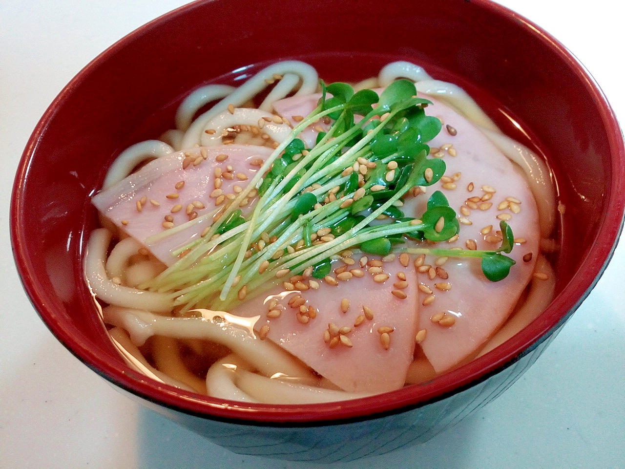 ロースハムとかいわれ大根と金ごまの半うどん（温）