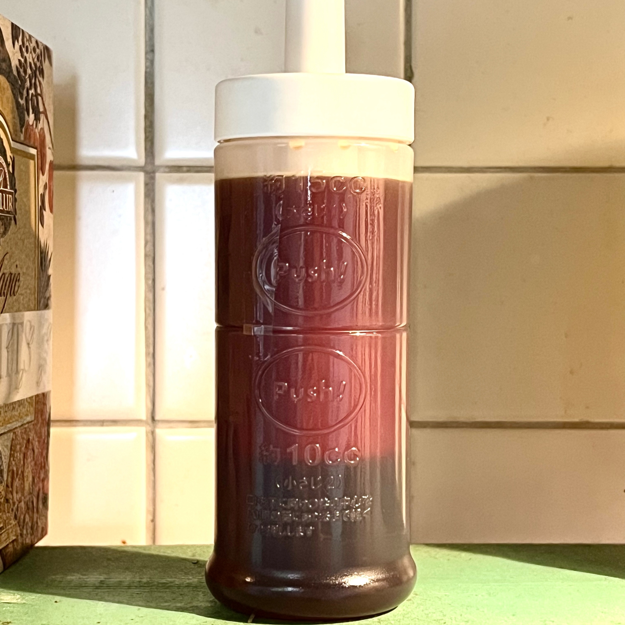 保存容器に入ったリンゴ酢入りポン酢