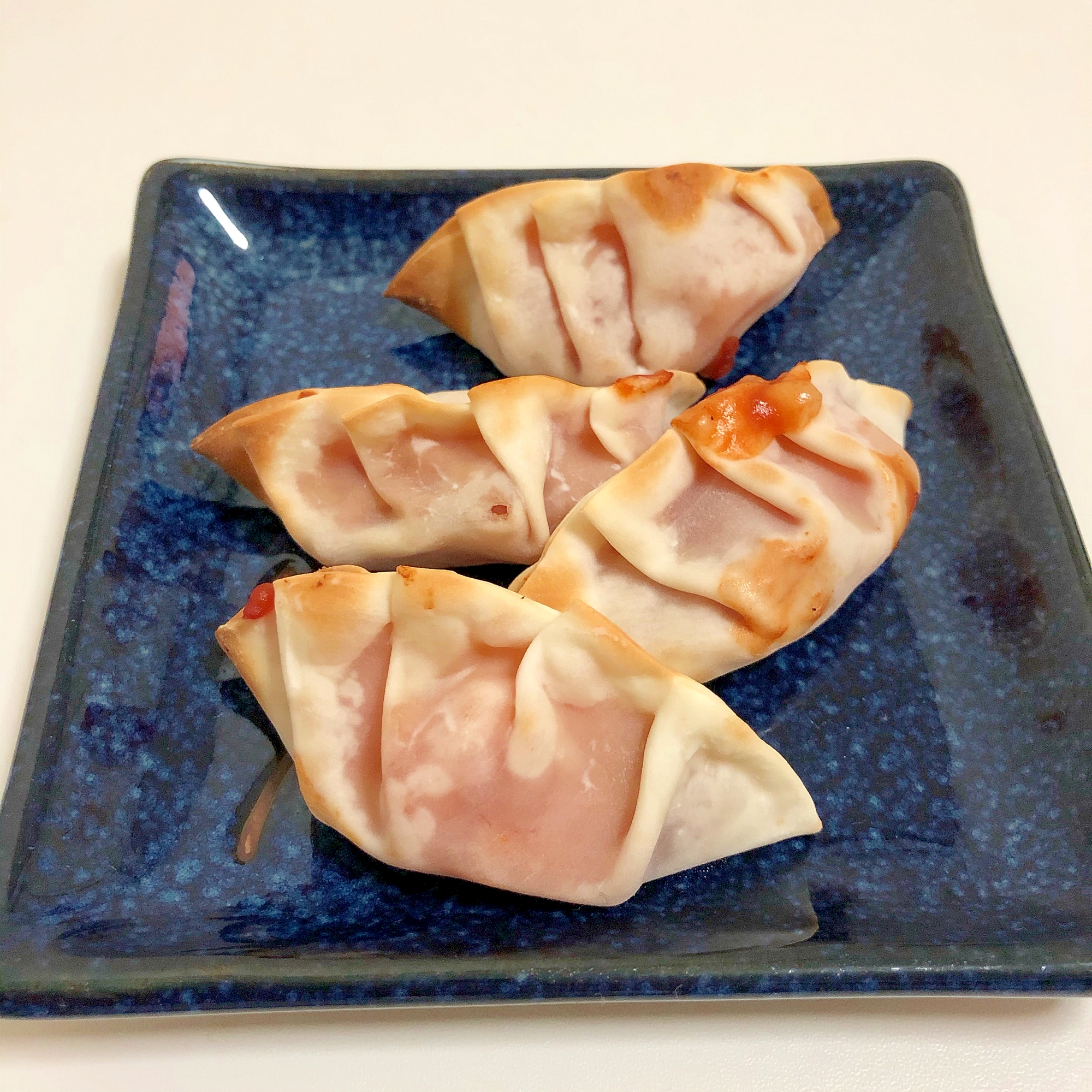 お弁当のおかず　ベーコン餃子の皮包み　♪