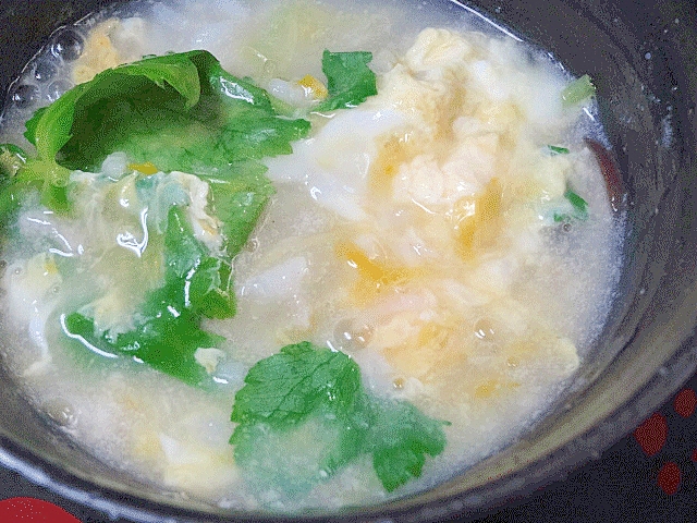 丸鶏塩茹でのスープは☆　定番「〆の雑炊」