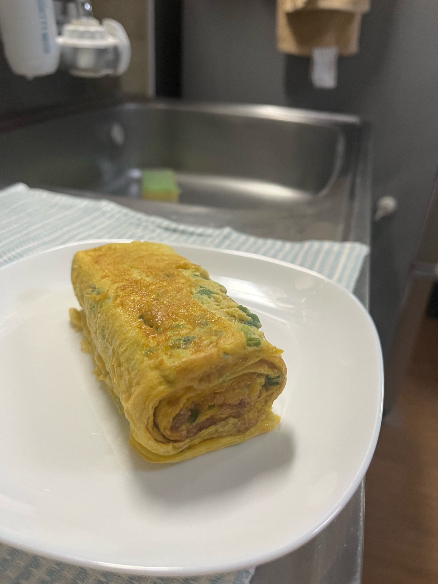 創味でネギ入りだし巻き卵