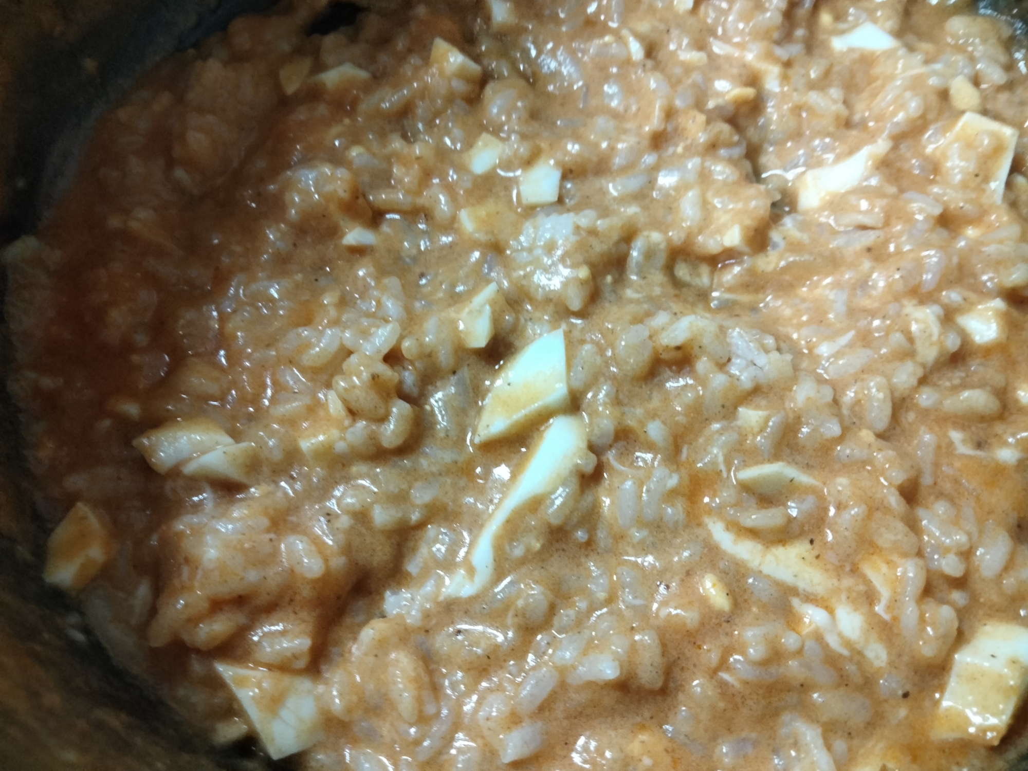 チーズ茹で卵トマト鍋スープの雑炊