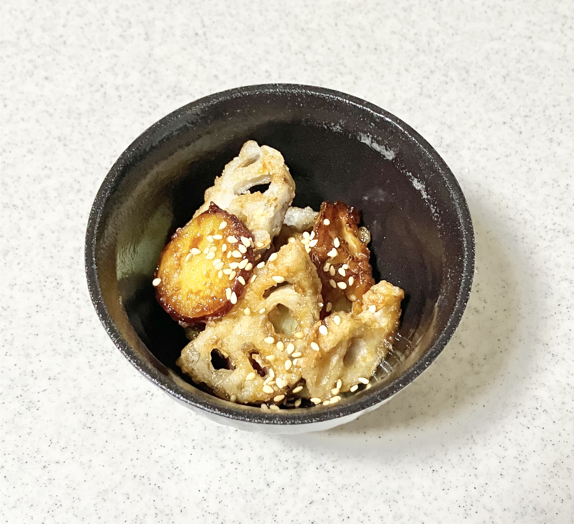 簡単⭐︎さつまいもと蓮根の甘辛炒め
