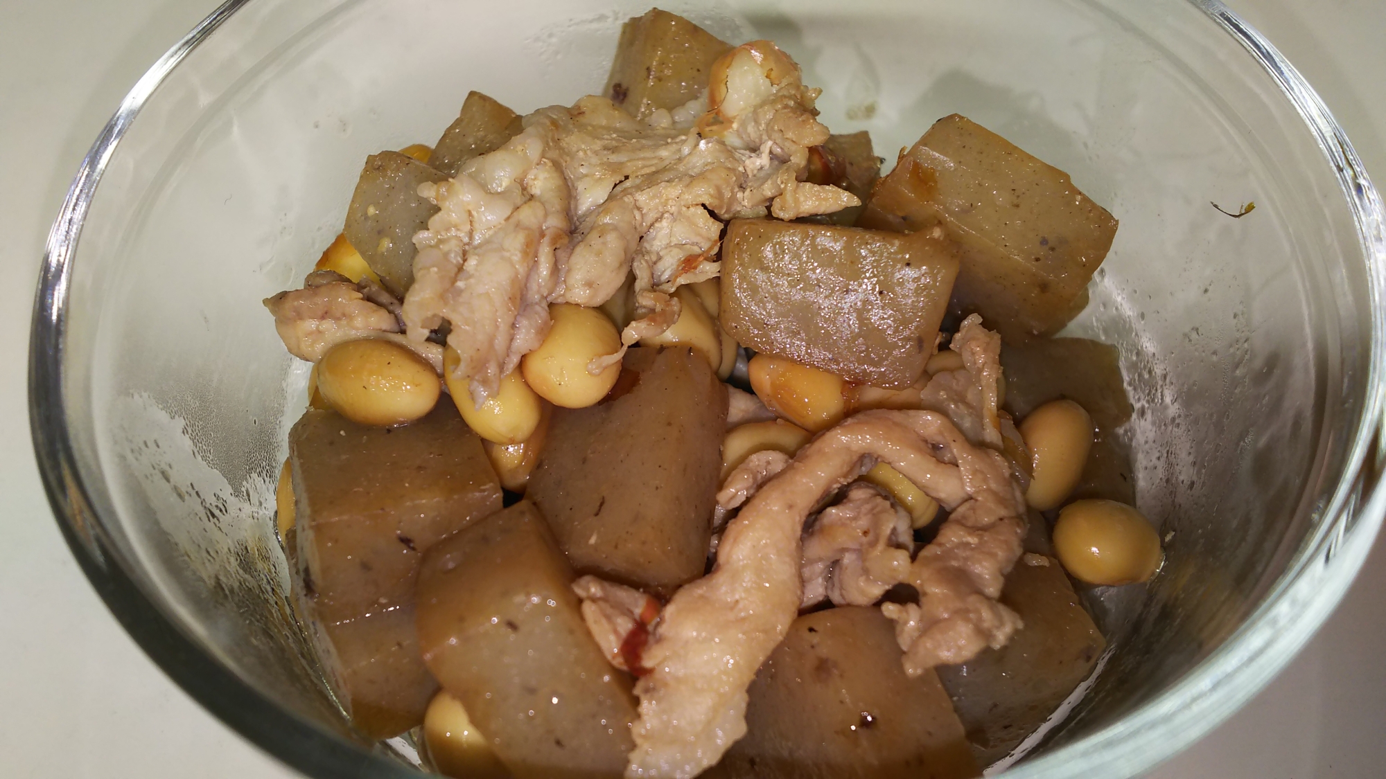こんにゃくと豚肉と大豆の炒めもの