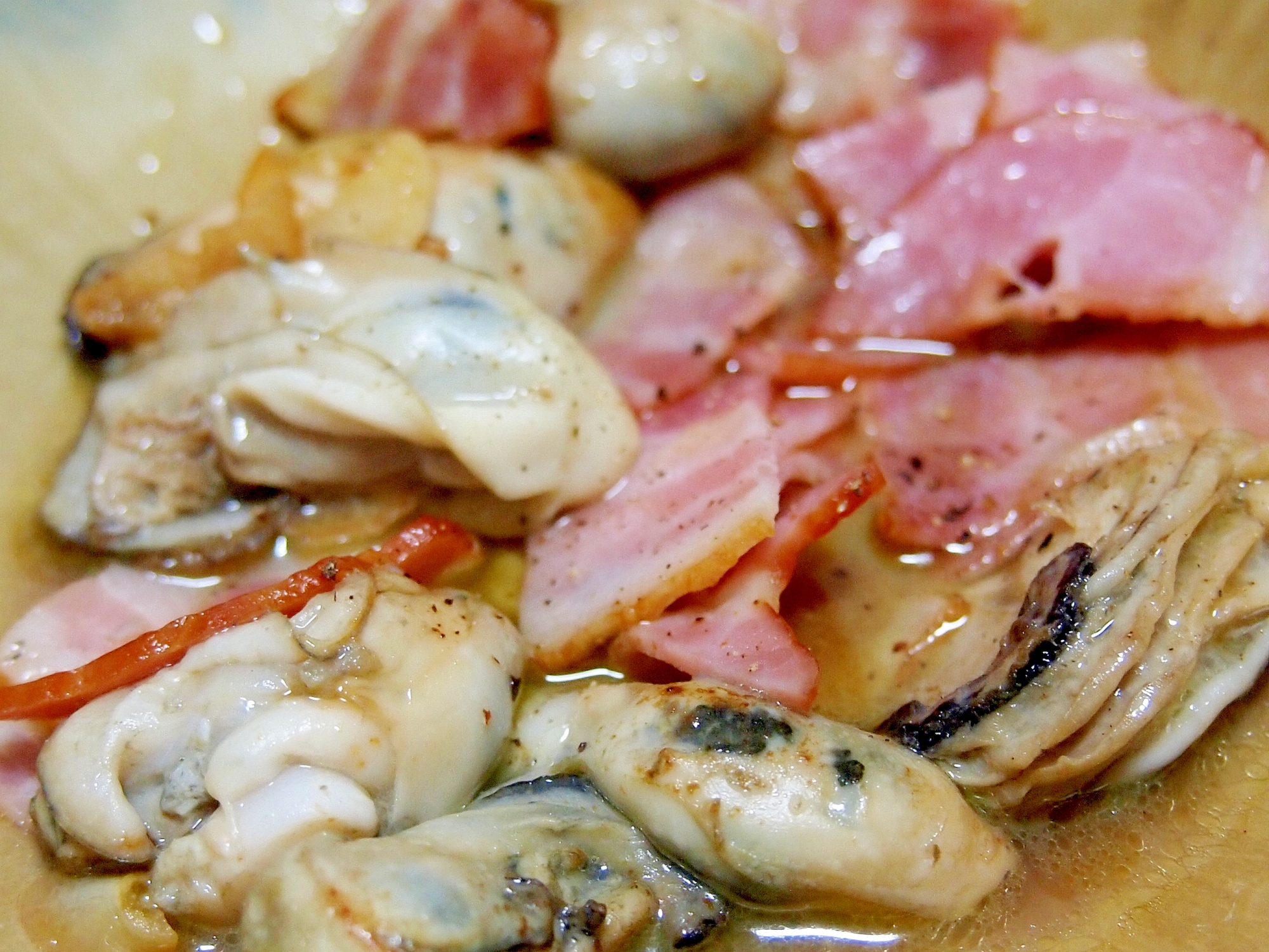 牡蠣とベーコンの炒め物