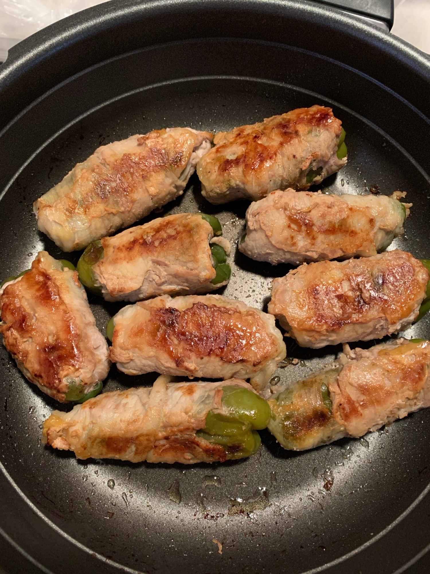 カレー風味丸ごとピーマン肉巻き