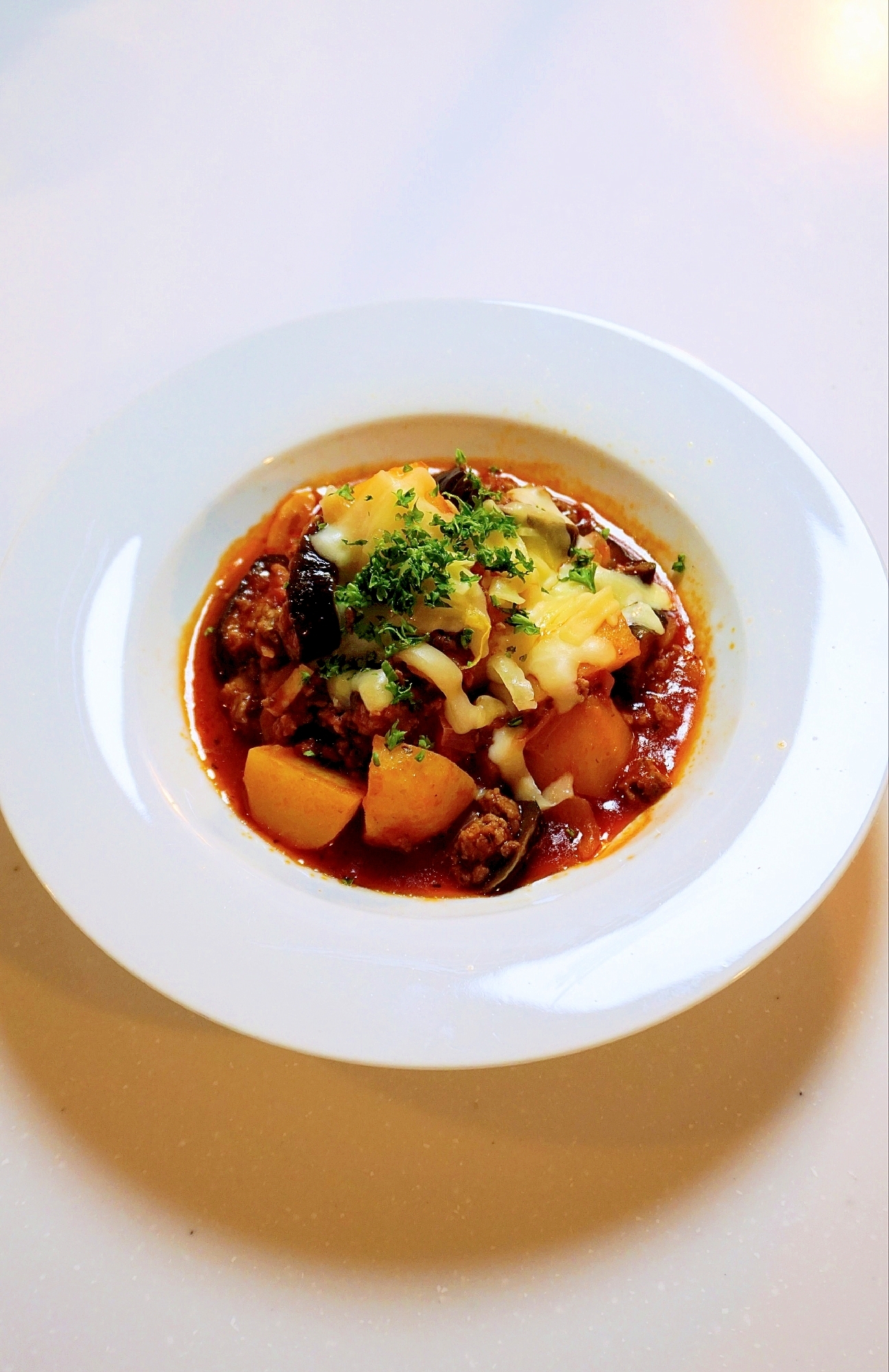 ナスとじゃがいもとひき肉のトマトチーズ焼き