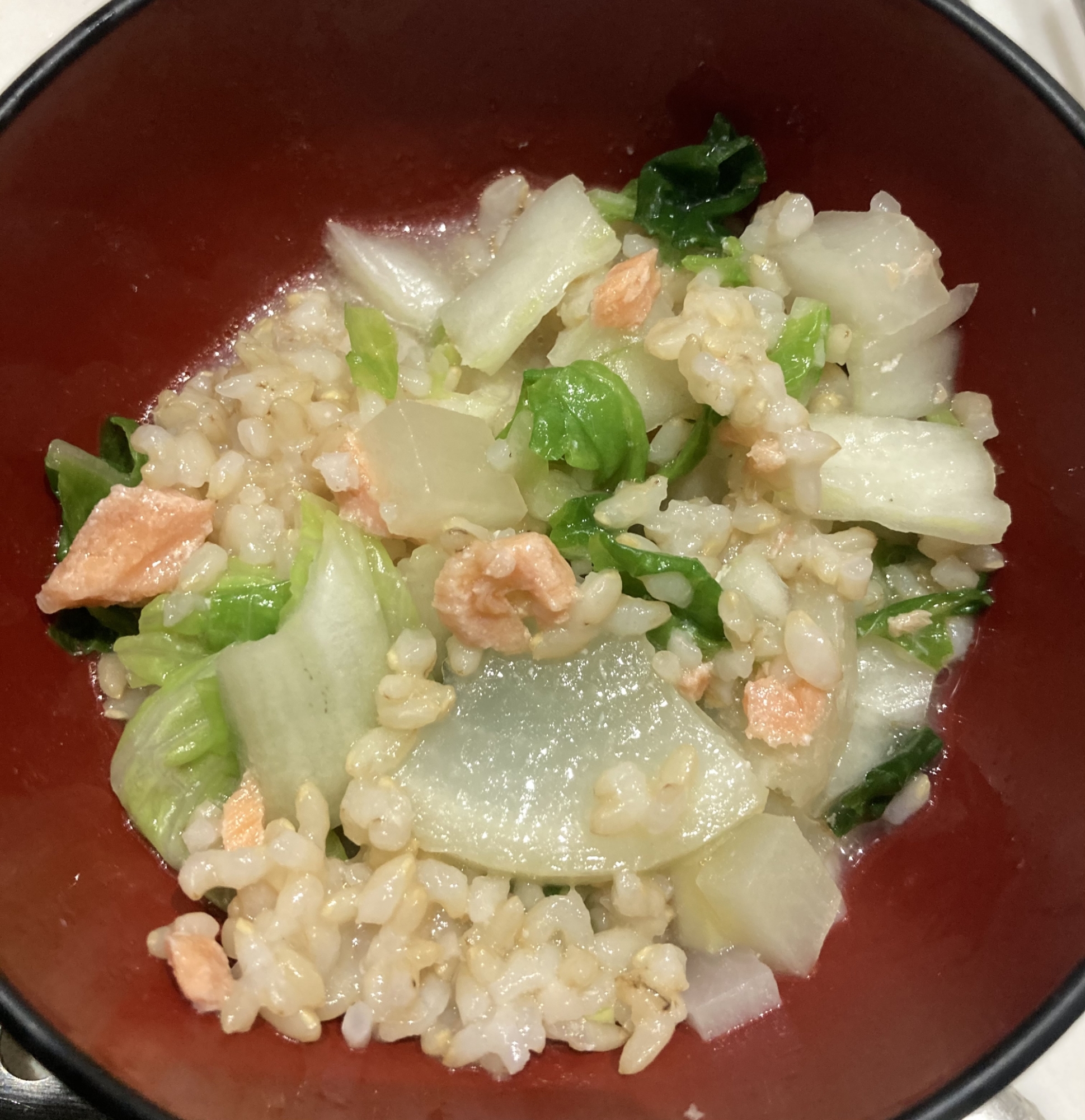 白菜と大根をいれた鮭の水煮缶雑炊