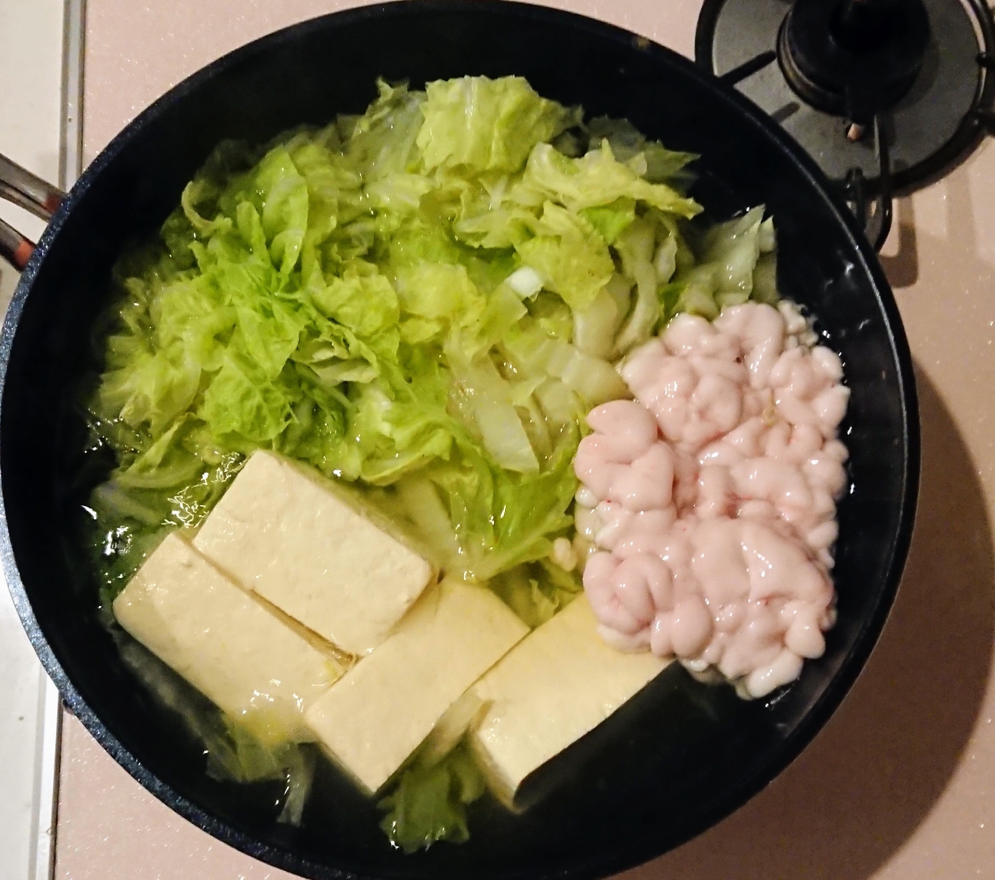 とろっと柔らか♡白子と白菜と湯豆腐